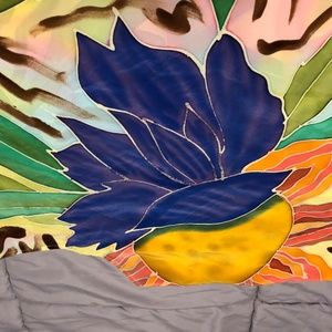 Beautiful colorful throw w/ short seam under arm.